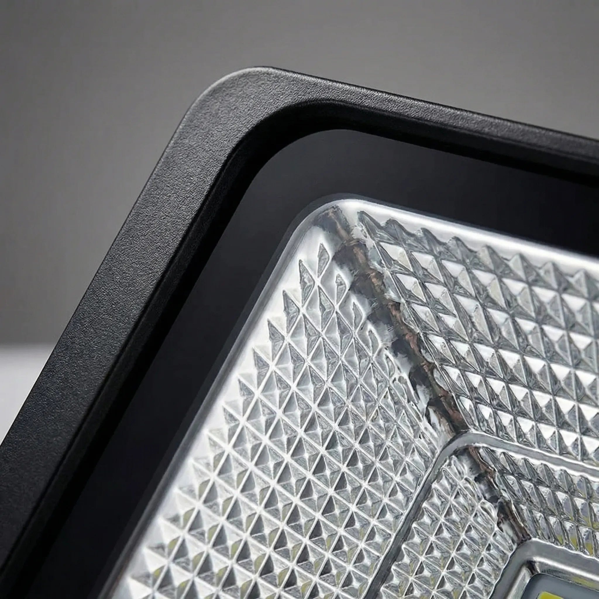 Solar-powered outdoor flood light with remote control and adjustable angle