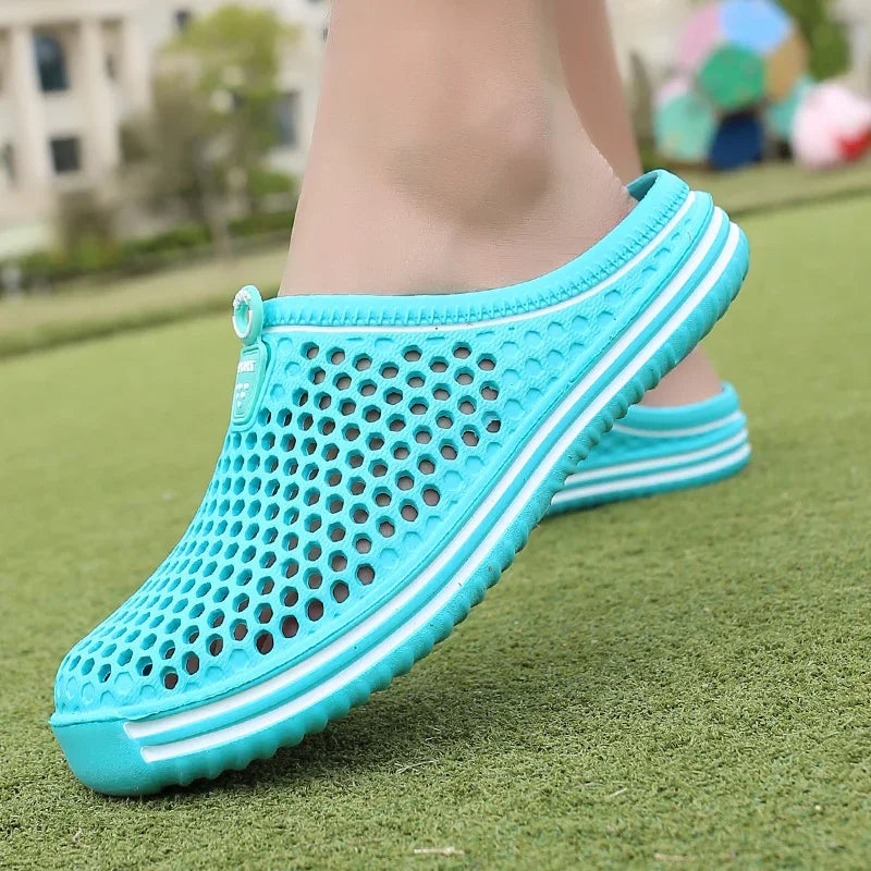 Perforated water sandals with slip-on design and quick-dry construction