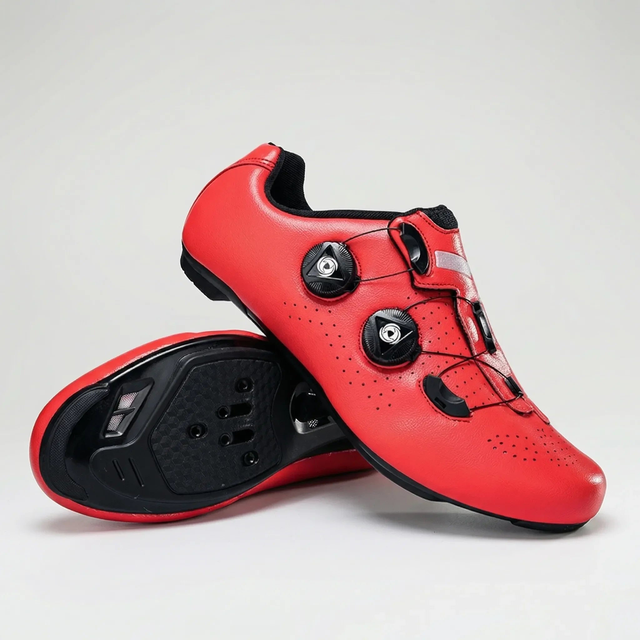 Self-locking cycling shoe with dual dial closure and perforated upper