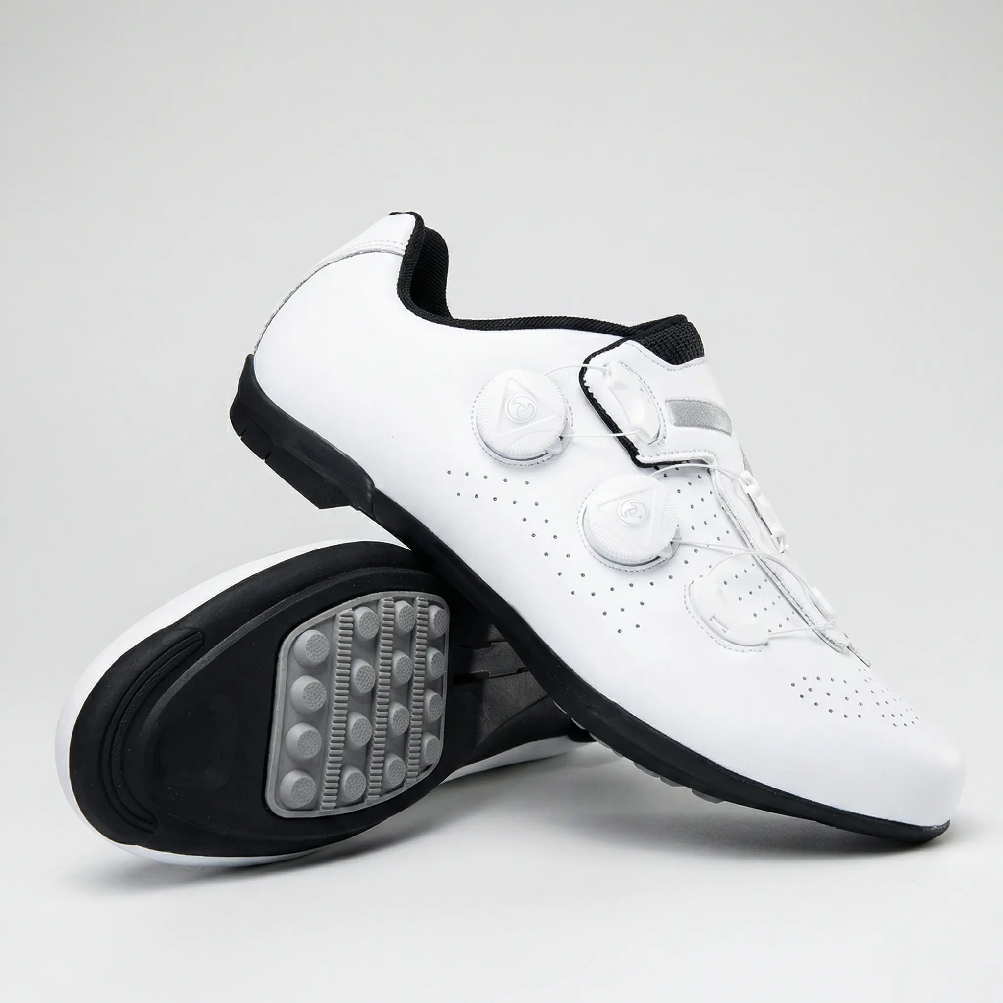 Self-locking cycling shoe with dual dial closure and perforated upper