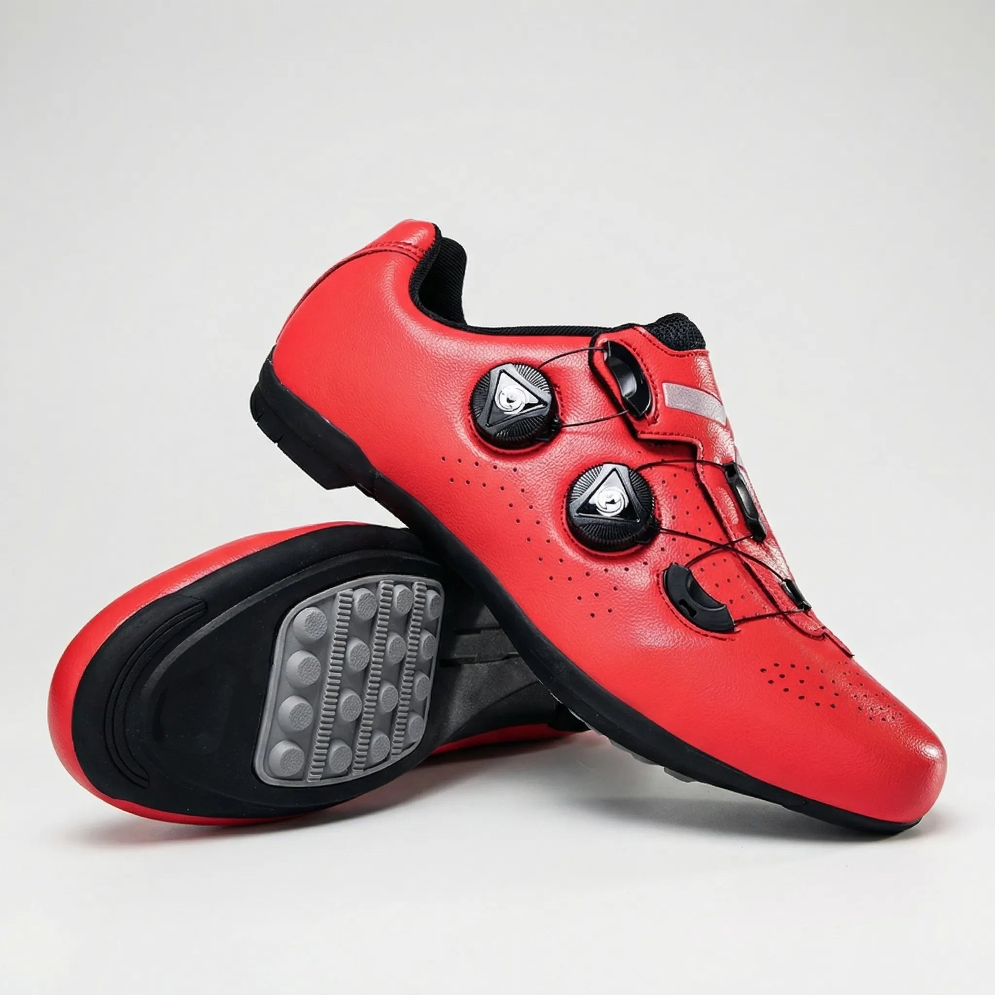 Self-locking cycling shoe with dual dial closure and perforated upper