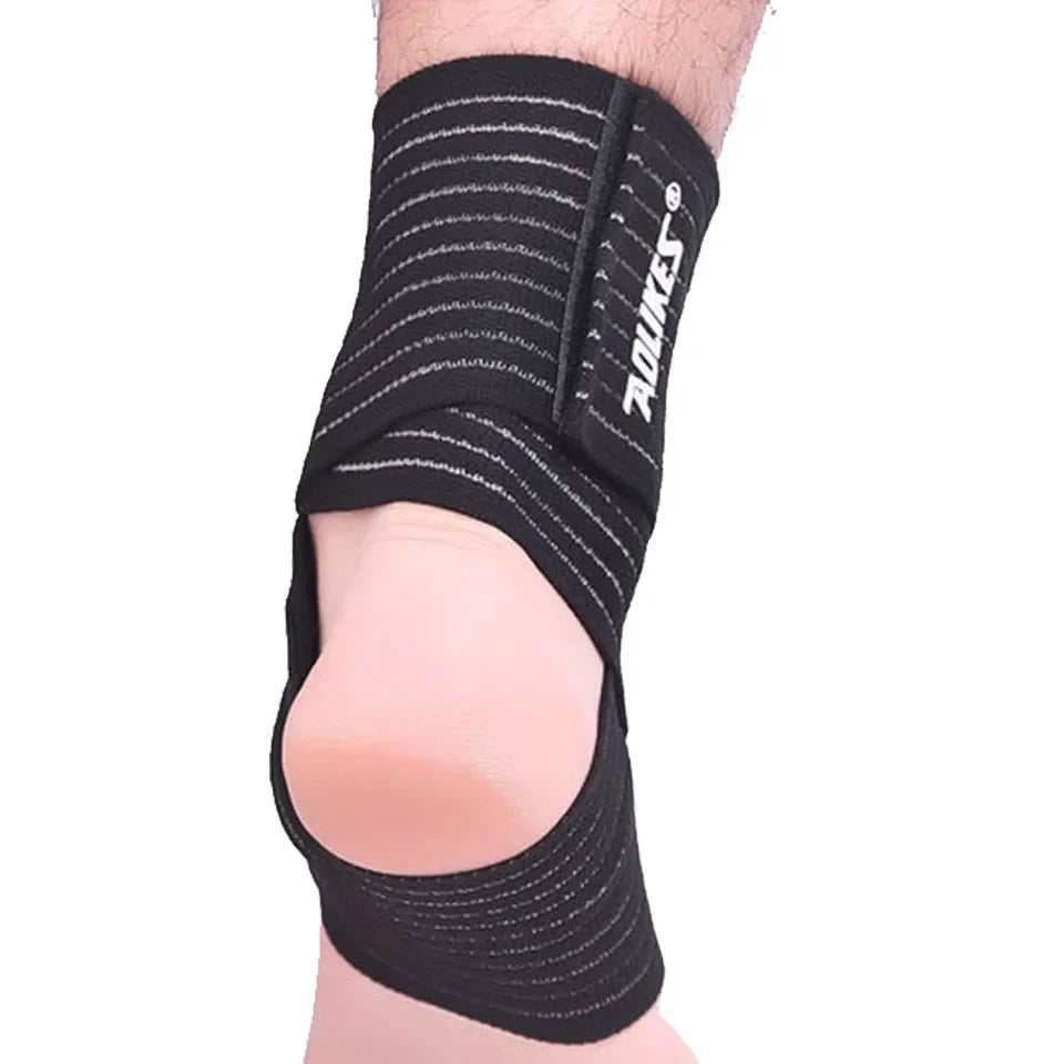 Adjustable ankle support wrap with targeted compression and breathable construction