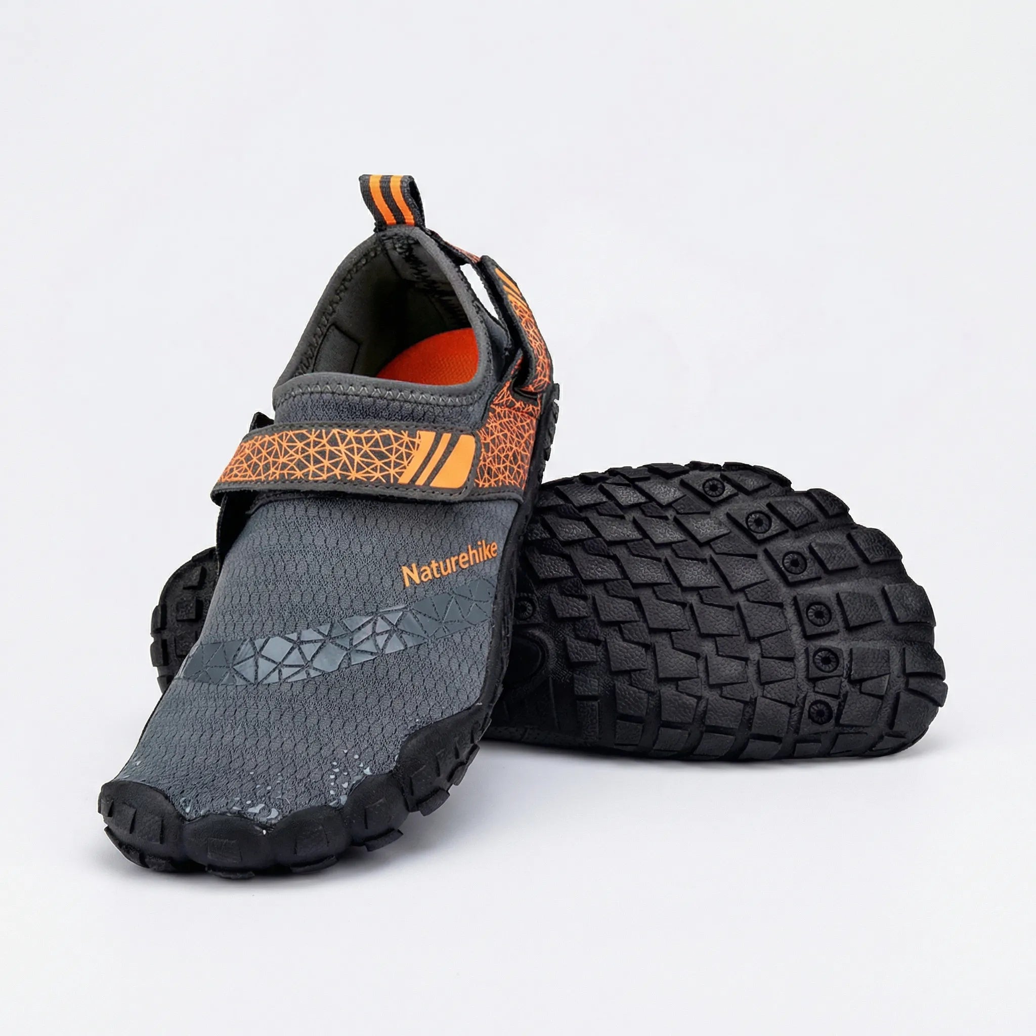 Quick-drying water shoes with non-slip sole, breathable mesh upper, and adjustable hook-and-loop strap