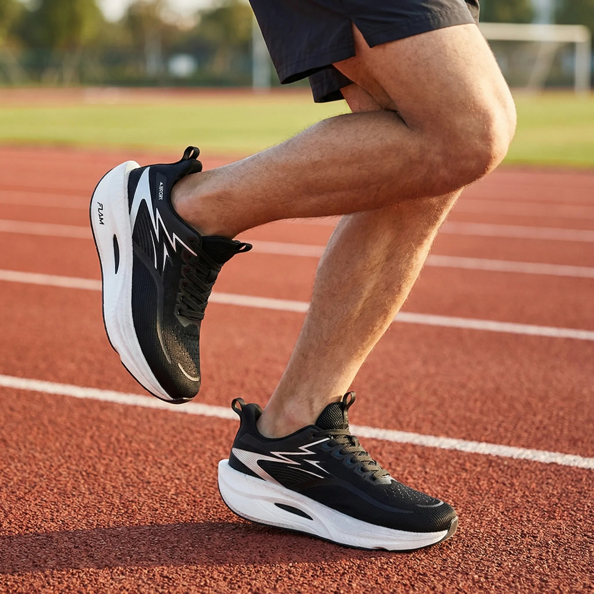 Running shoe with air cushion heel and carbon plate mesh upper