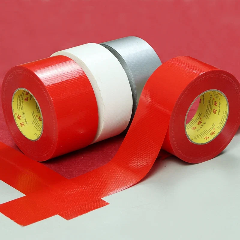 Heavy-duty cloth tape with fabric-reinforced backing and water-resistant surface