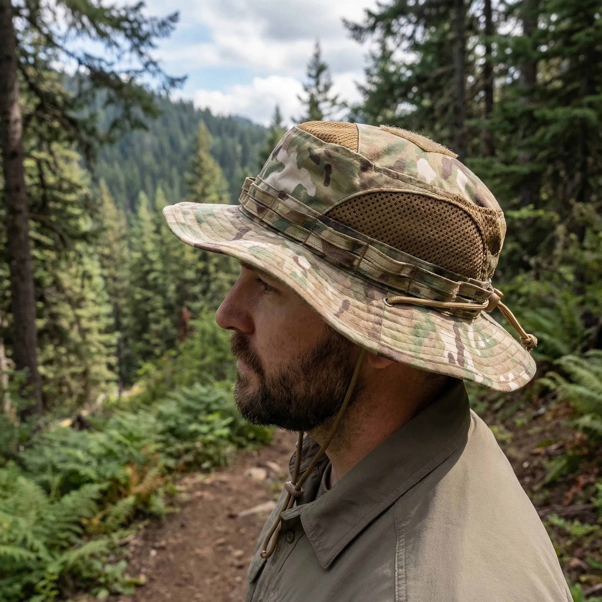 Wide-brim tactical boonie hat with mesh ventilation and adjustable chin cord