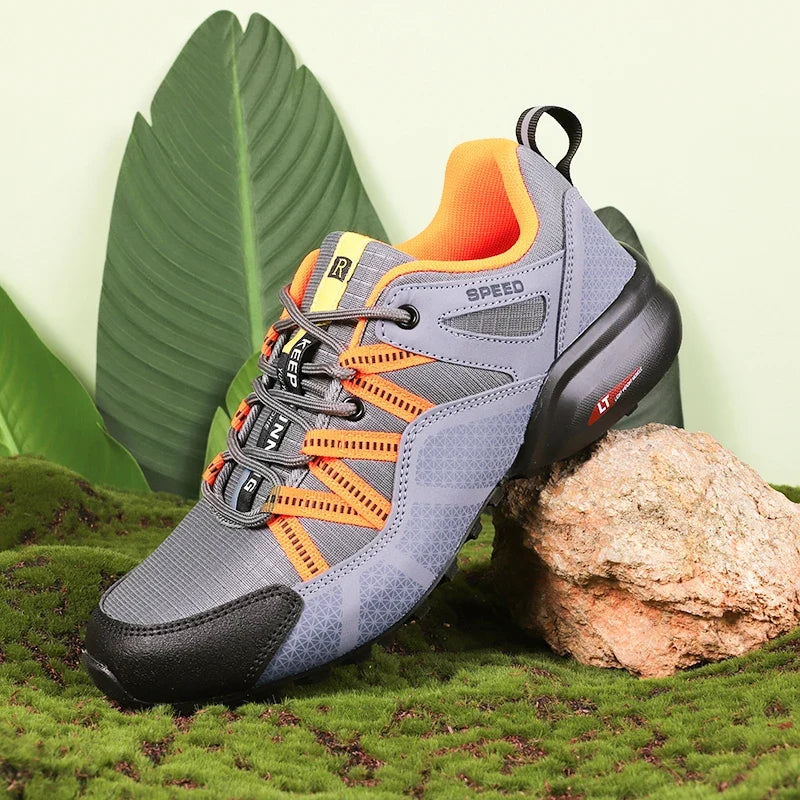 Men's outdoor sneaker with multi-terrain lugged sole and reinforced toe cap