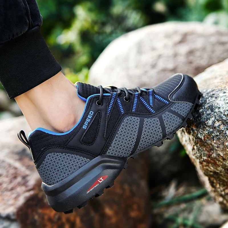 Men's outdoor sneaker with multi-terrain lugged sole and reinforced toe cap