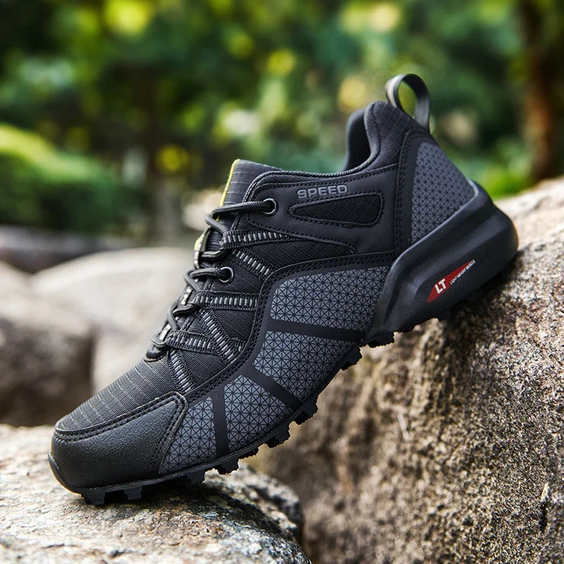 Men's outdoor sneaker with multi-terrain lugged sole and reinforced toe cap