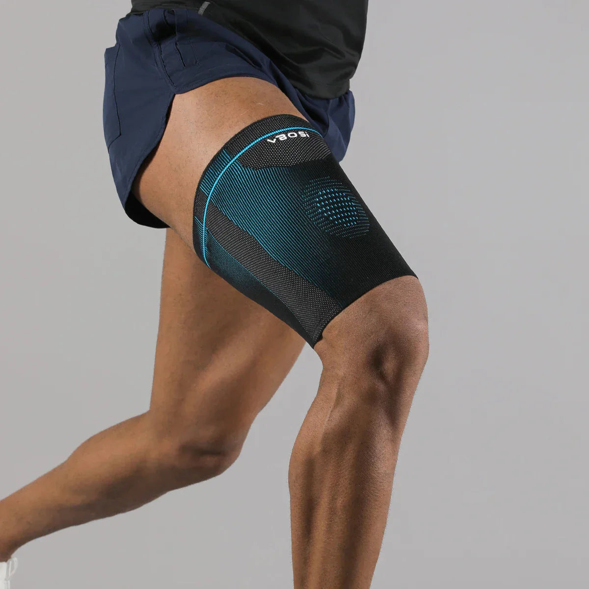 Non-slip compression thigh sleeve with breathable knit fabric for athletic support