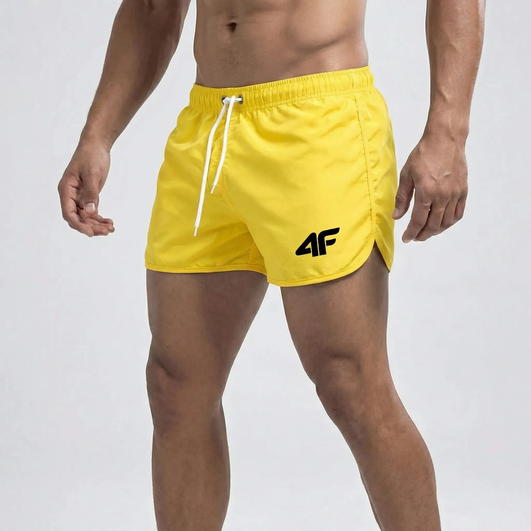 Men's short length swim trunks with quick dry fabric and side pockets