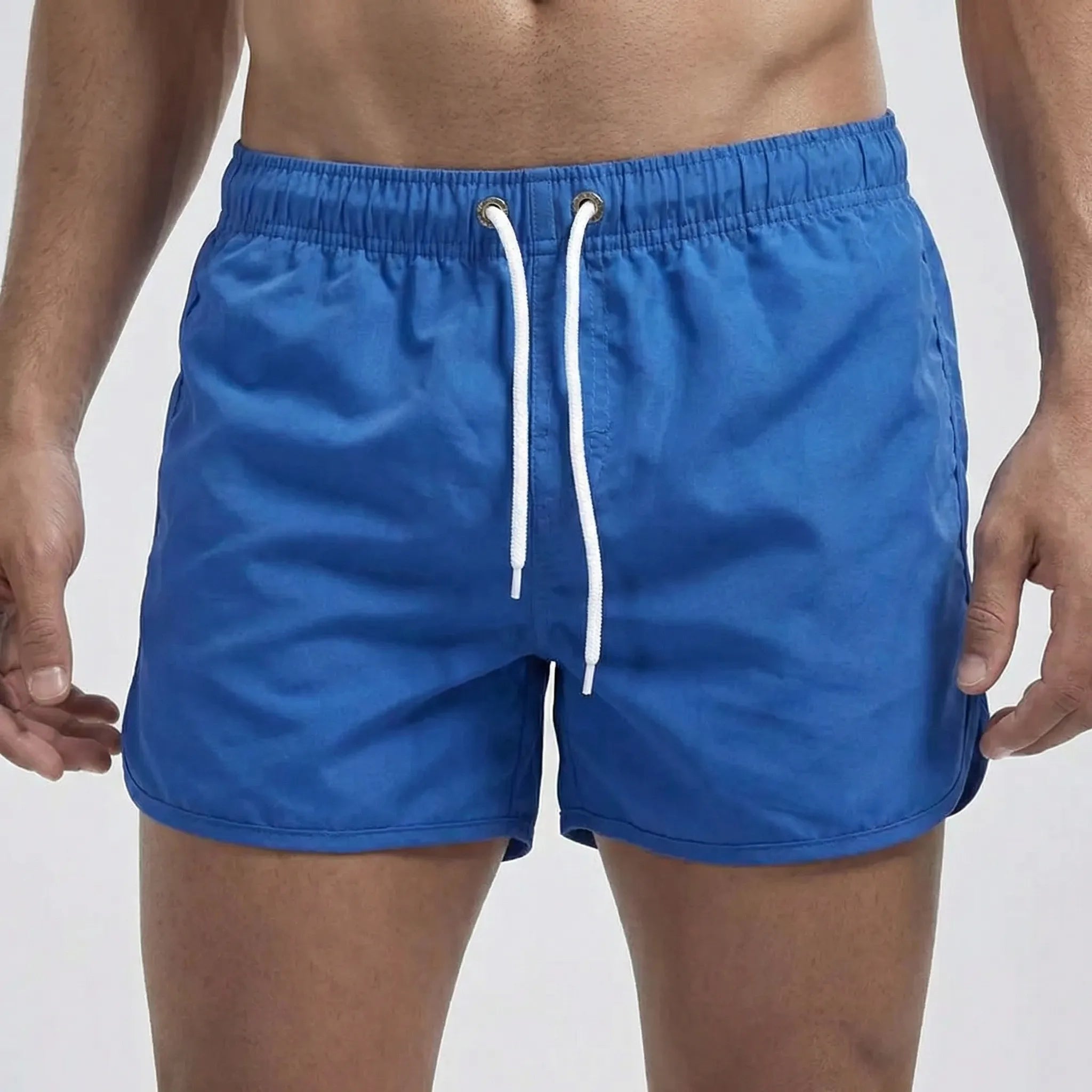 Men's low waist swim shorts with adjustable draw cord and curved hem