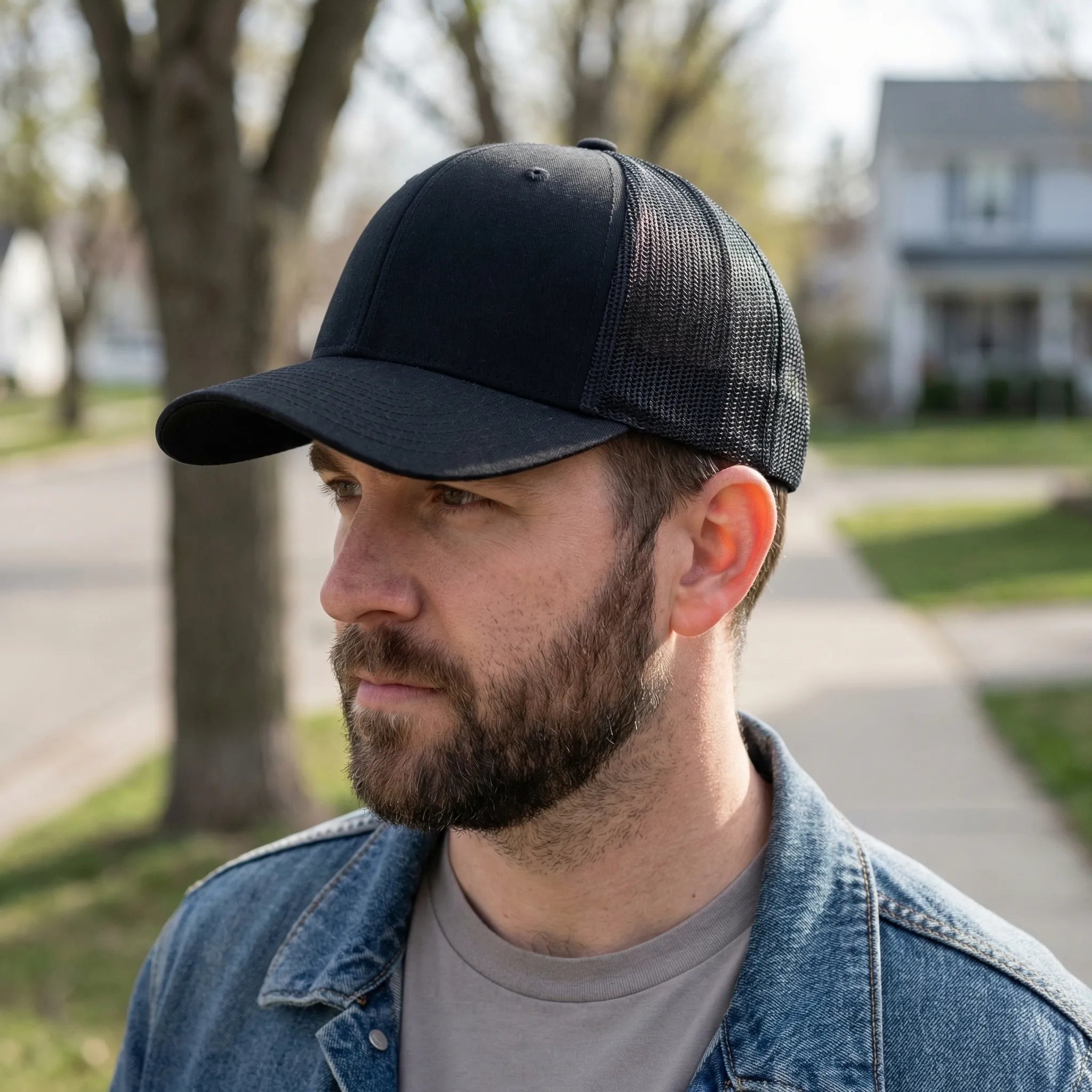 Unisex trucker cap with curved brim and breathable mesh back panel