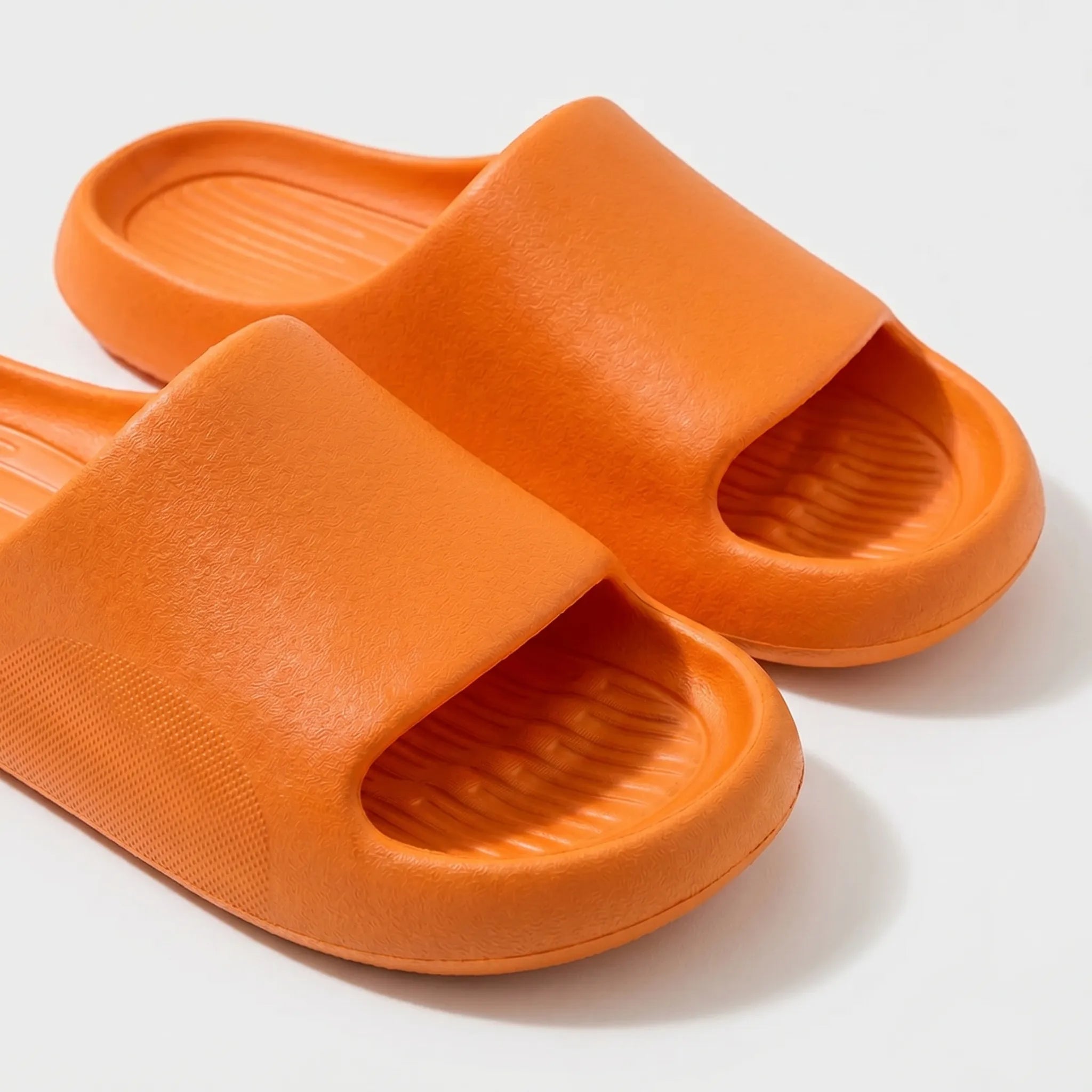 Chunky clog slippers with thick platform sole, open toe design, structured footbed