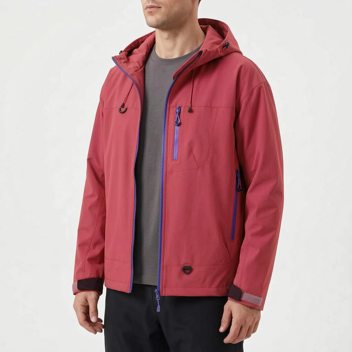 Women's waterproof hiking jacket with adjustable hood and zippered pockets