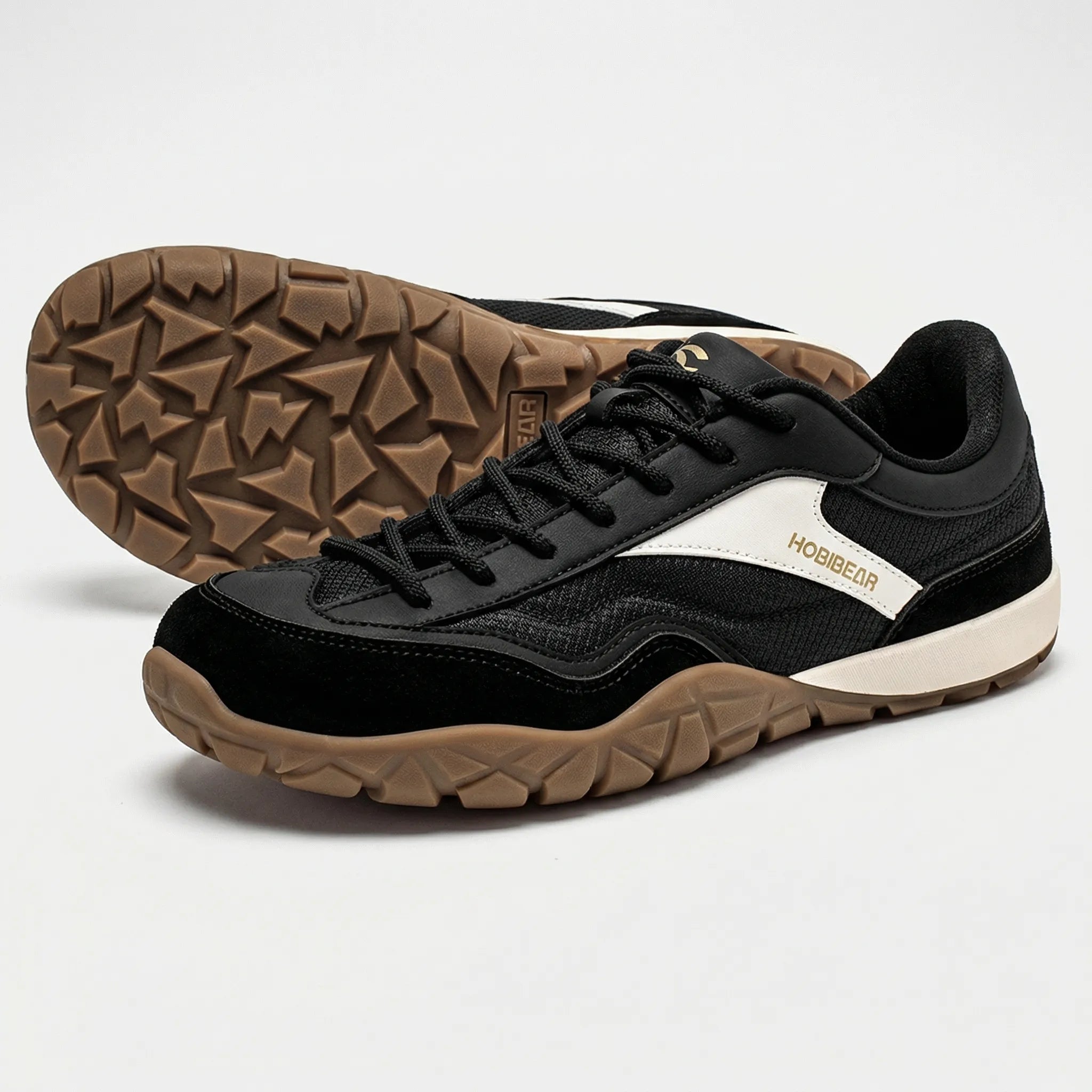 Wide-fit trail walking shoes with non-slip sole and retro styling