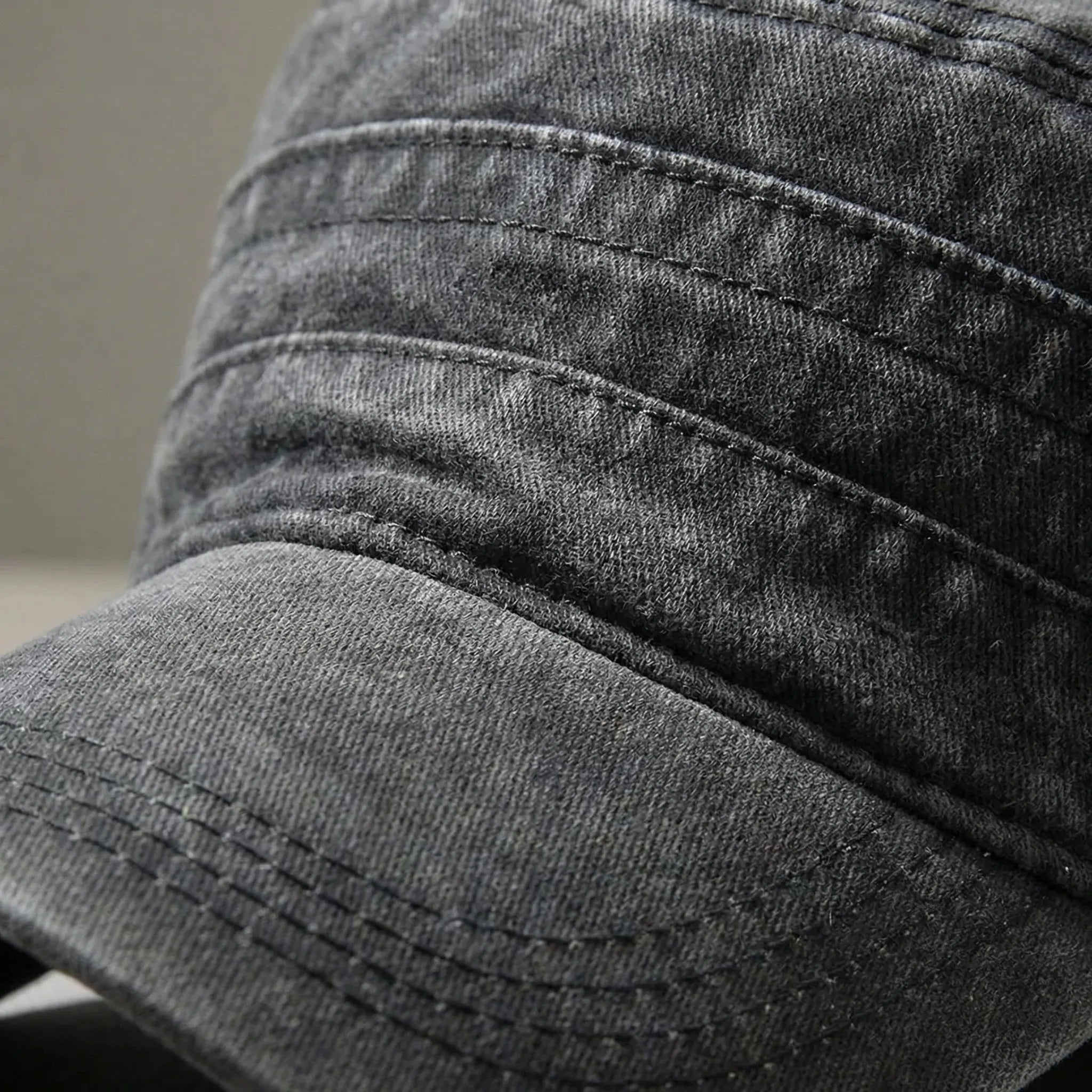 Washed flat-top military cap with short brim and generous fit