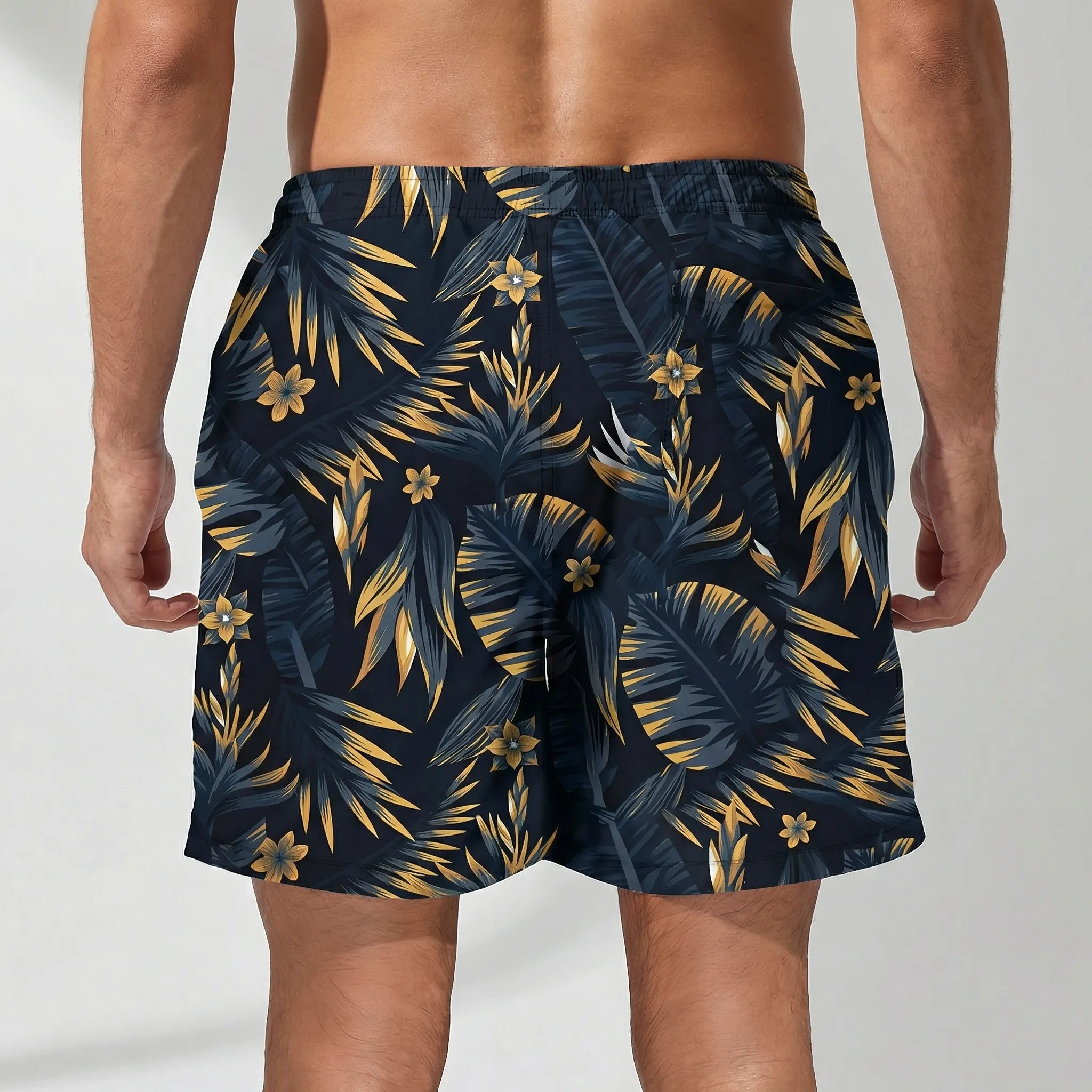 Men's relaxed fit swim shorts with quick-dry tropical leaf print