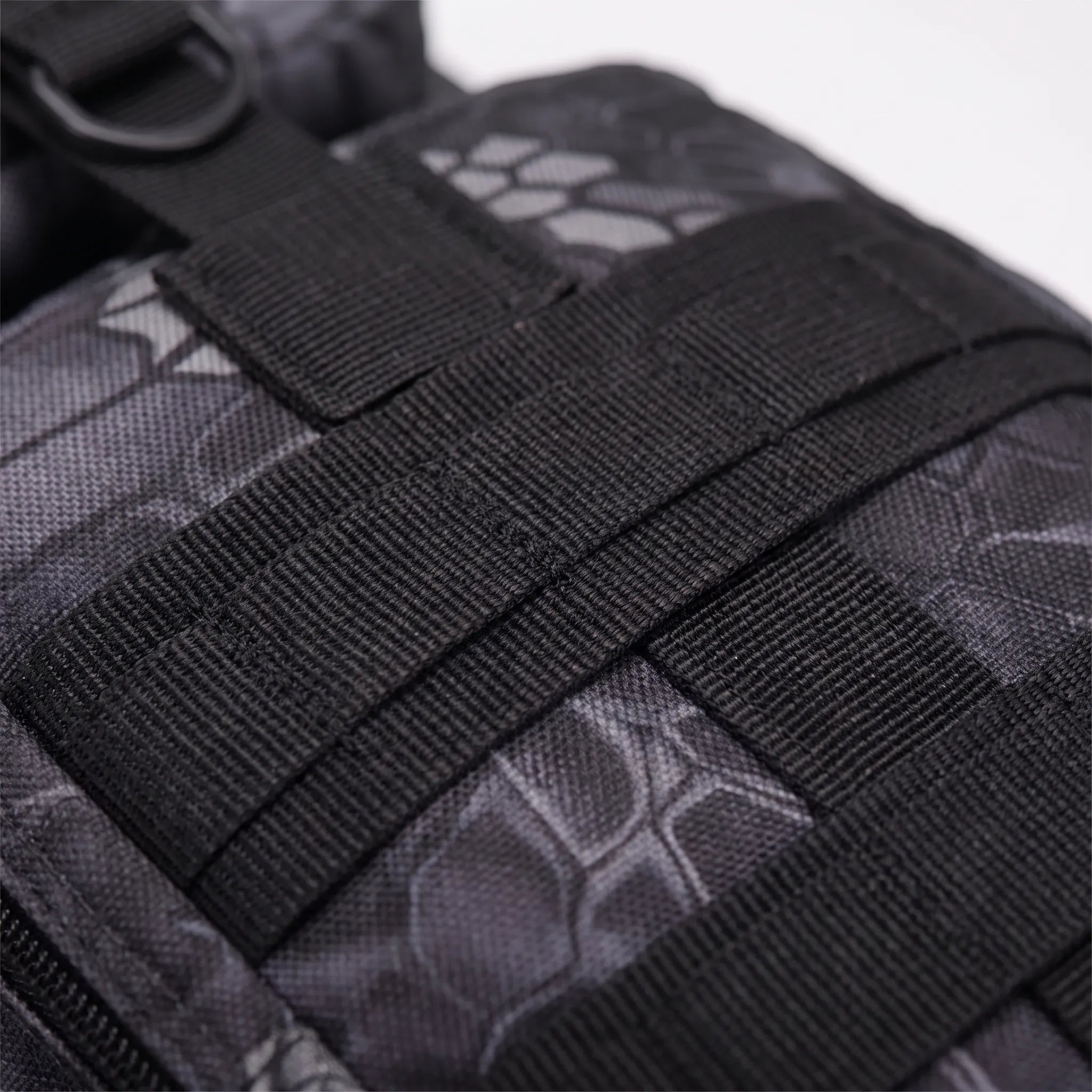 Multi-compartment day pack with padded straps and compression design