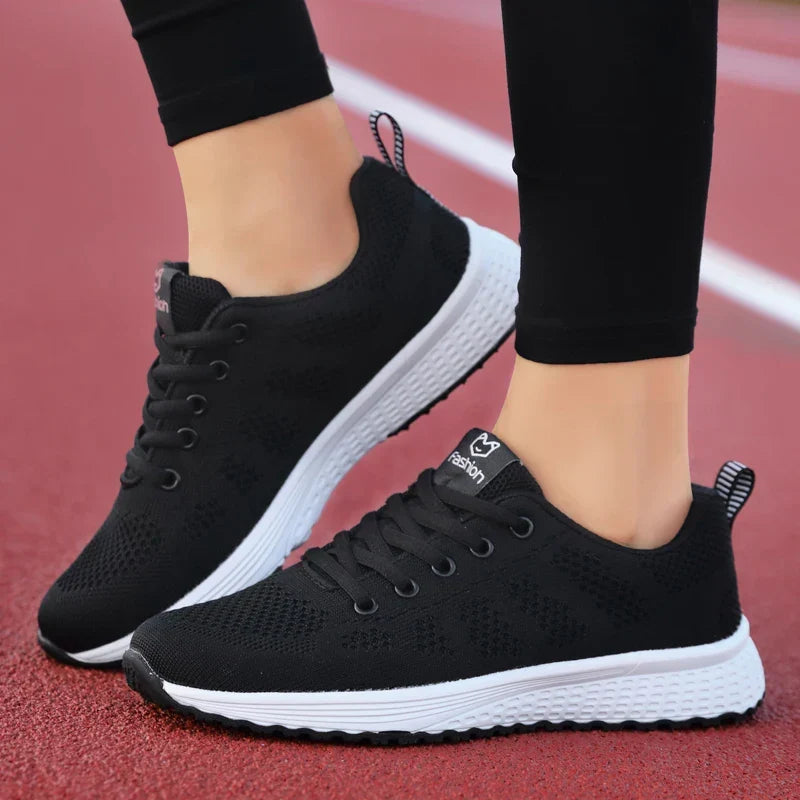 Women's low cut sport shoe with breathable mesh upper and cushioned sole