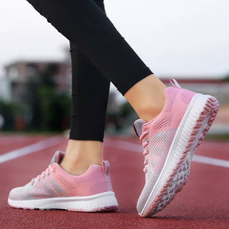 Women's low cut sport shoe with breathable mesh upper and cushioned sole