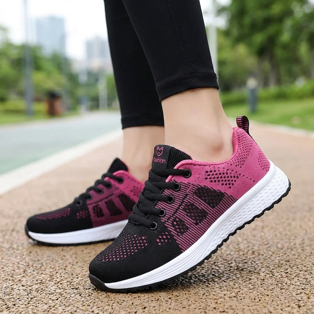 Women's low cut sport shoe with breathable mesh upper and cushioned sole