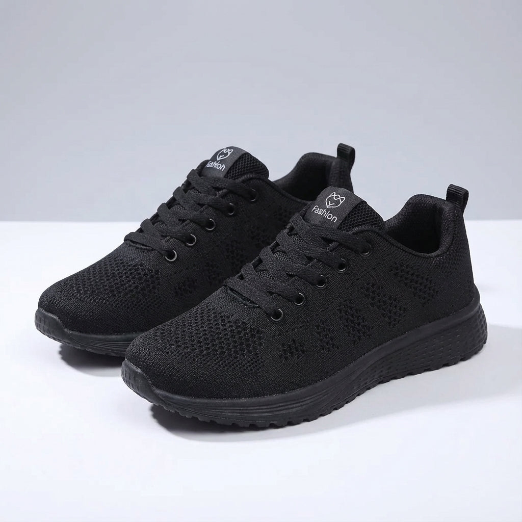 Women's low cut sport shoe with breathable mesh upper and cushioned sole