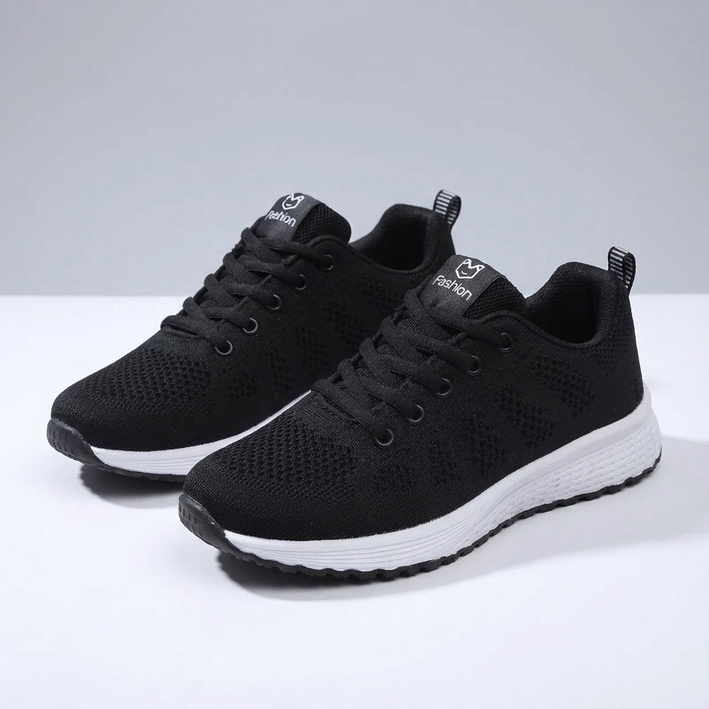 Women's low cut sport shoe with breathable mesh upper and cushioned sole