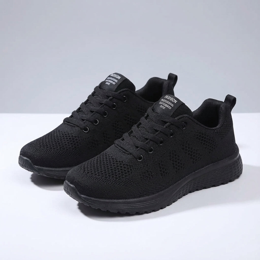 Women's low cut sport shoe with breathable mesh upper and cushioned sole