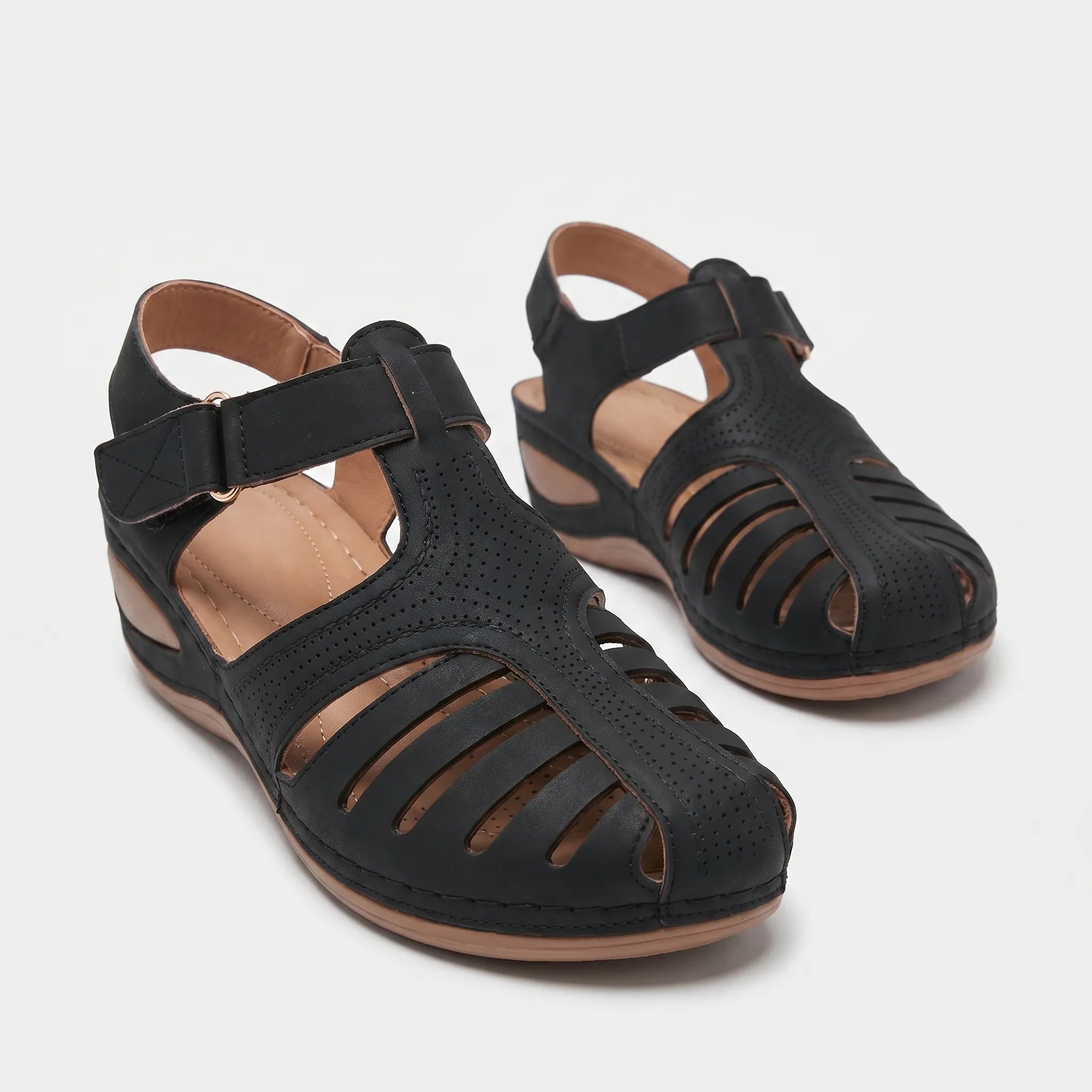 Women's summer sandal with low wedge heel, adjustable strap, and wide toe box