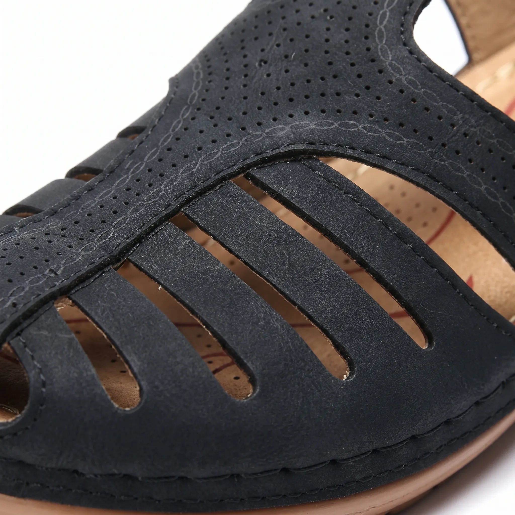 Women's summer sandal with low wedge heel, adjustable strap, and wide toe box