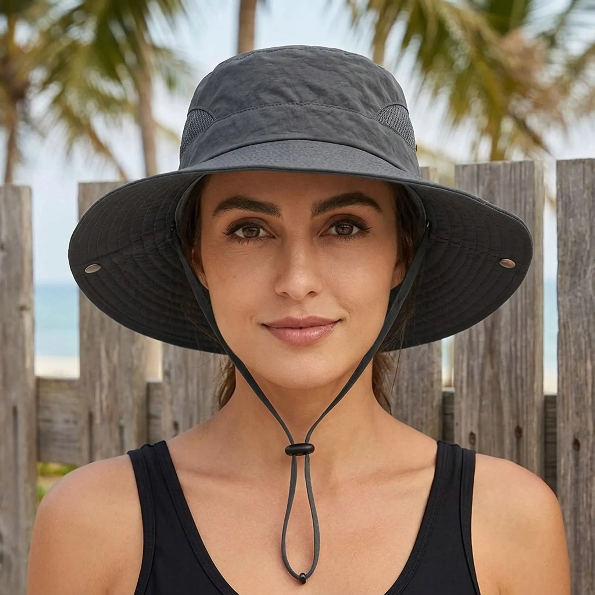 Wide-brim sun hat with mesh ventilation and rear ponytail opening
