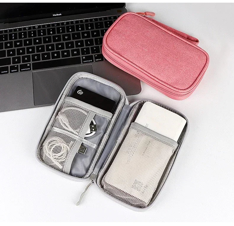 Travel accessories tech organizer with adjustable dividers and water-repellent shell