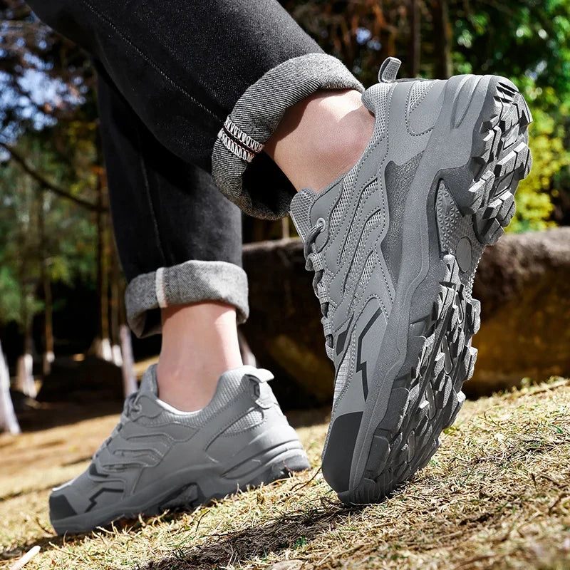 Women's waterproof hiking shoe with ankle support and tread pattern