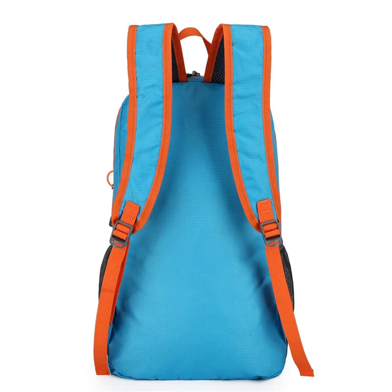 Packable daypack with water-repellent finish and breathable mesh straps