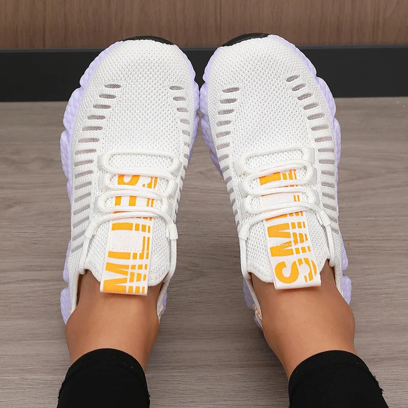 Low profile running shoe with breathable knit upper and padded sole