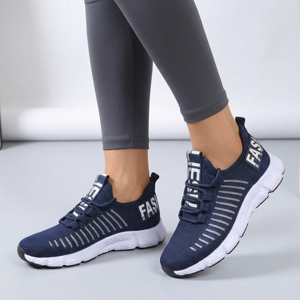 Low profile running shoe with breathable knit upper and padded sole