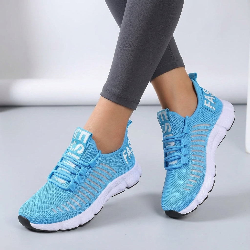 Low profile running shoe with breathable knit upper and padded sole