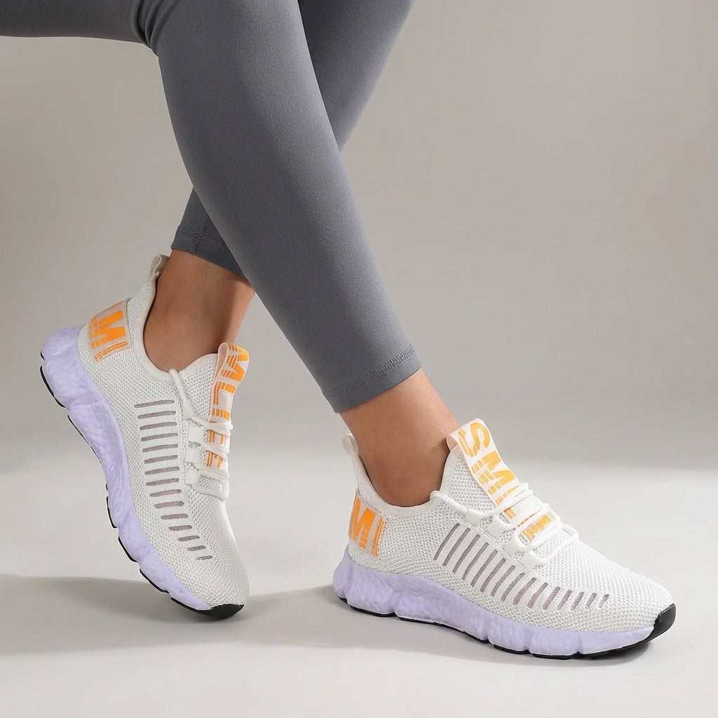 Low profile running shoe with breathable knit upper and padded sole