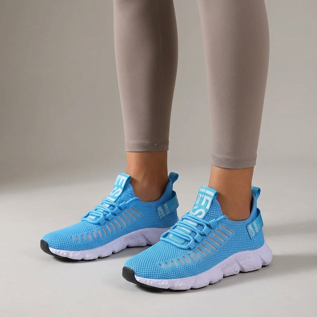 Low profile running shoe with breathable knit upper and padded sole