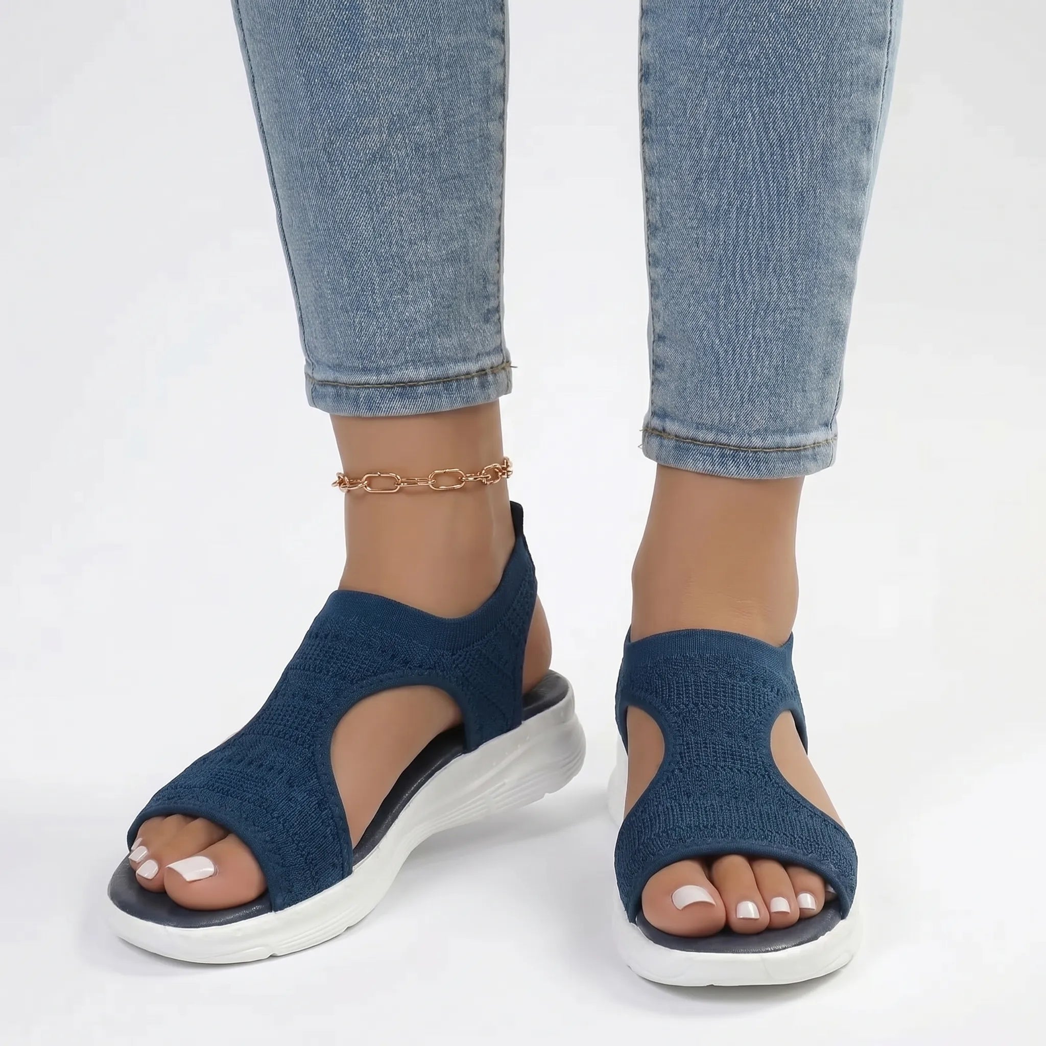 Knit sport wedge sandal with heel strap and breathable mesh upper
