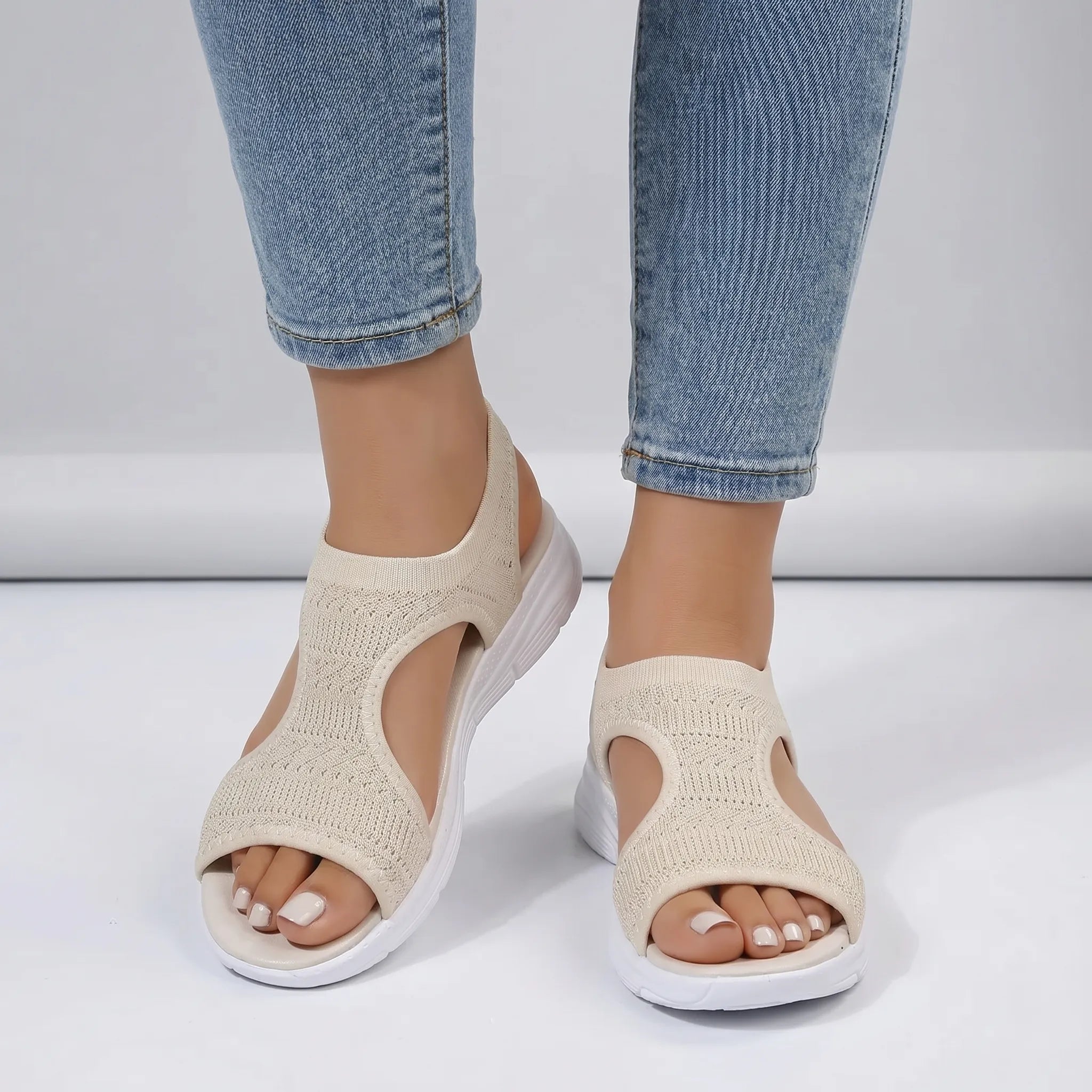 Knit sport wedge sandal with heel strap and breathable mesh upper