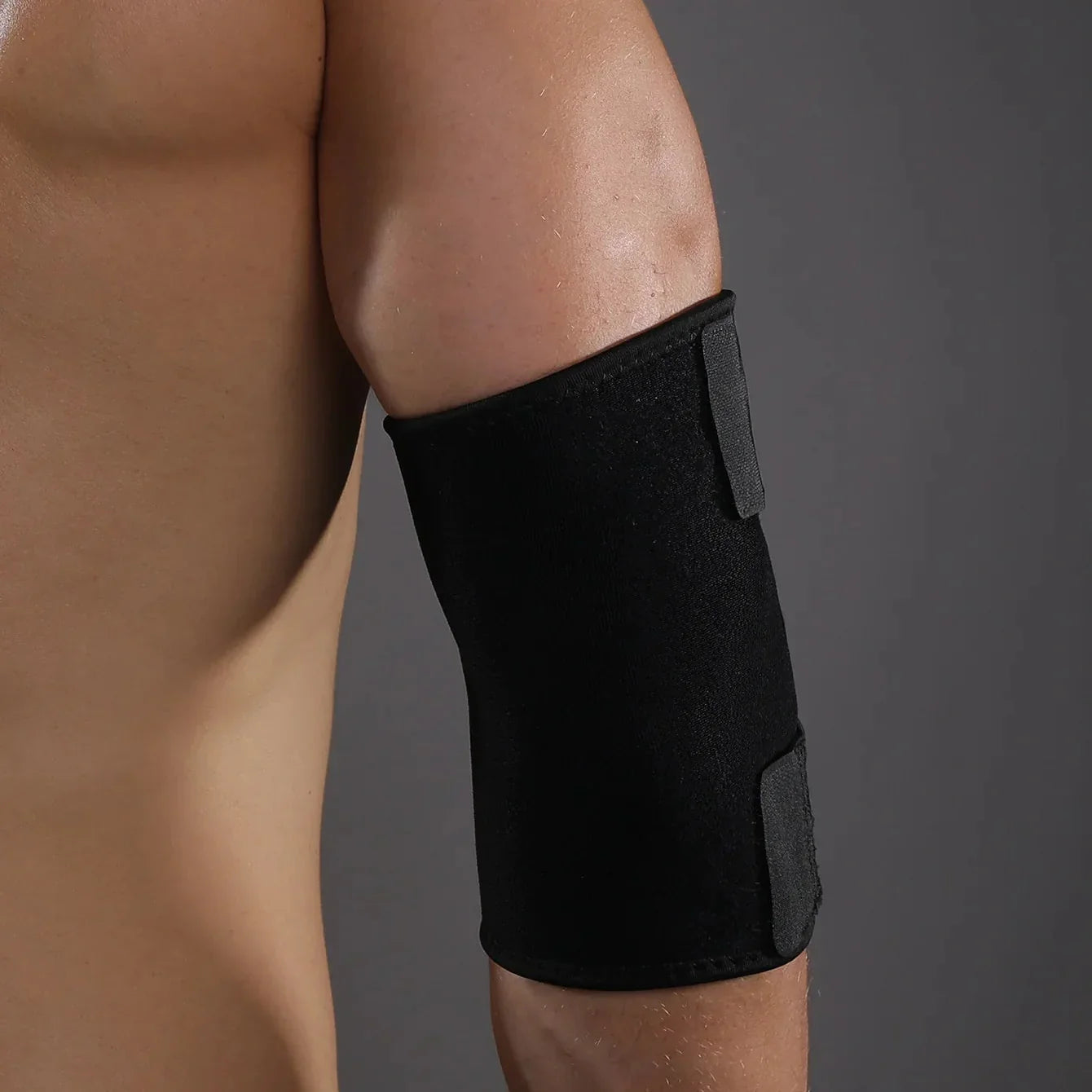Adjustable elbow brace with compression and joint stabilization support