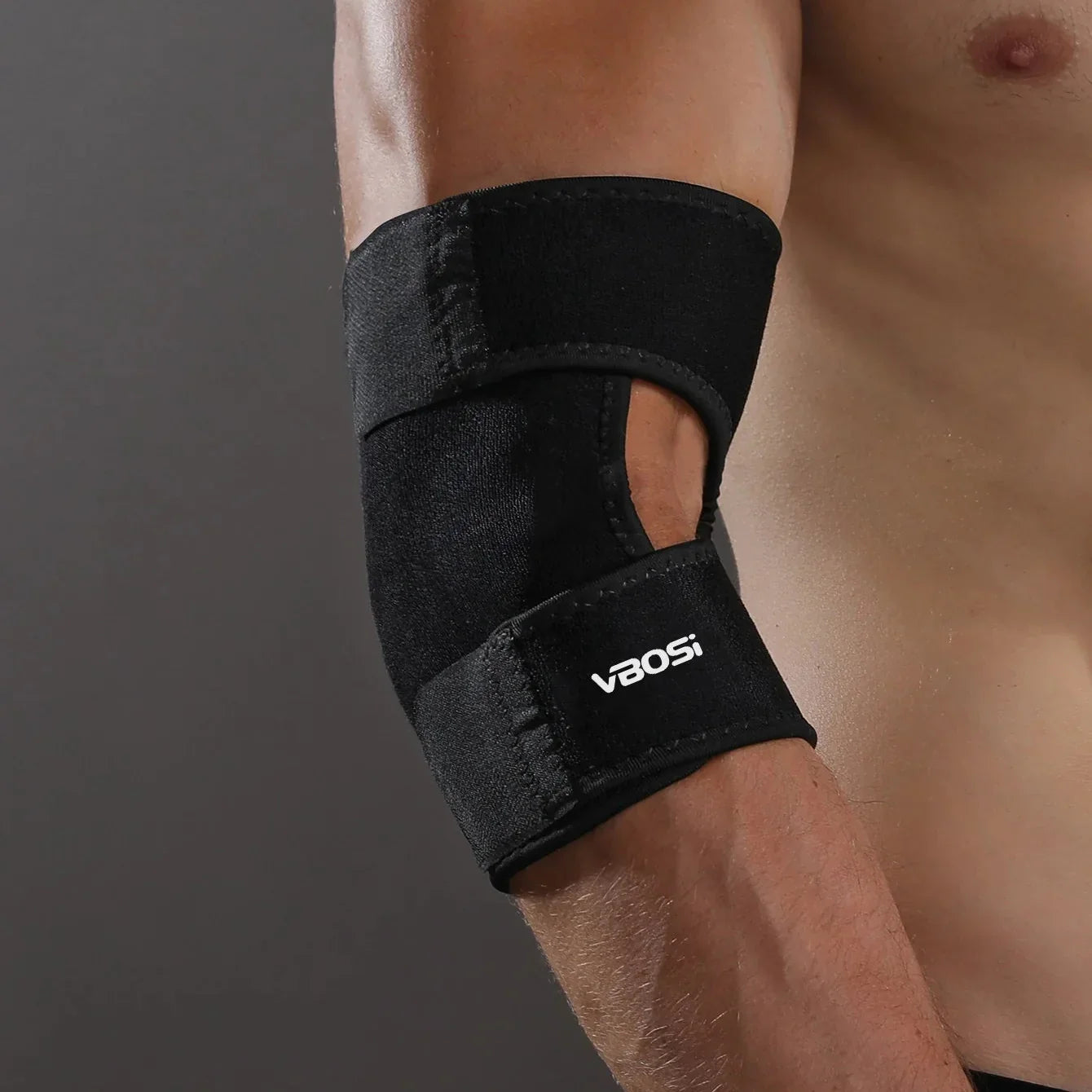 Adjustable elbow brace with compression and joint stabilization support