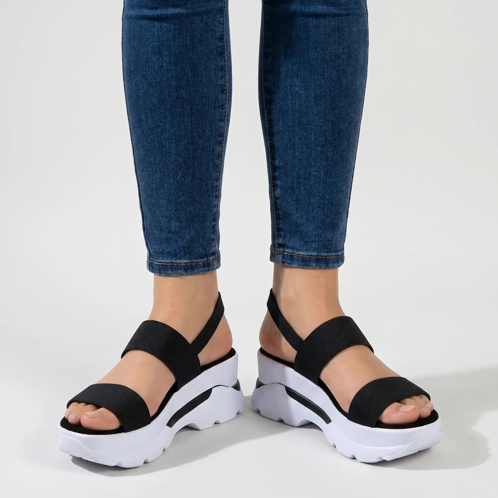 Chunky plateau wedge sandal with wide textured straps and open toe