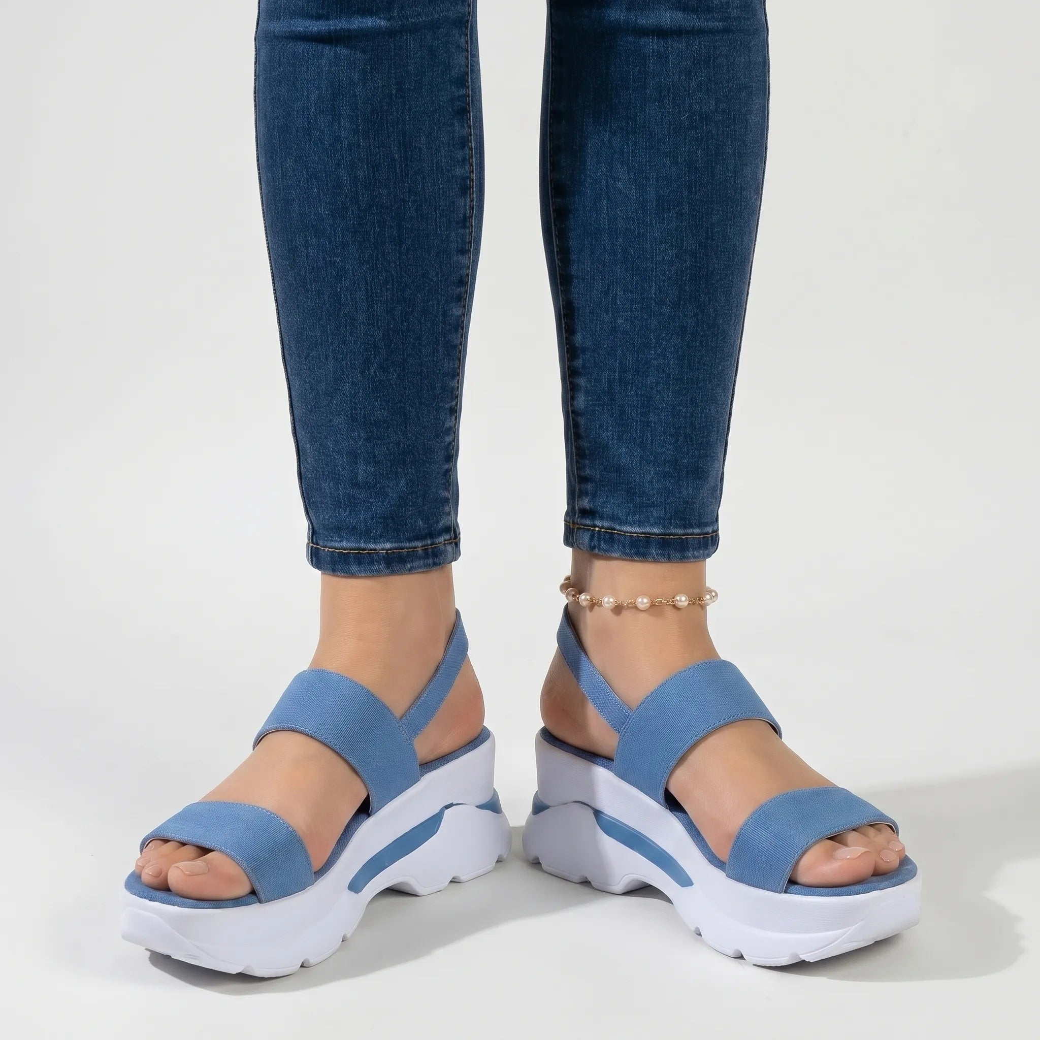 Chunky plateau wedge sandal with wide textured straps and open toe