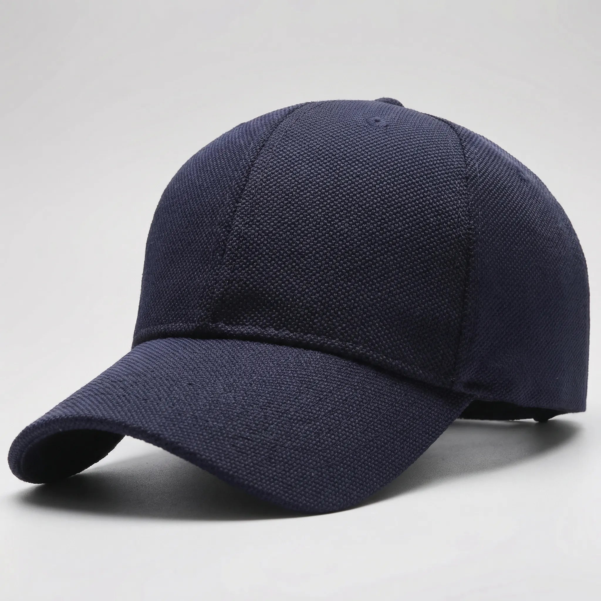 Minimalist baseball cap with adjustable flat peak and structured crown