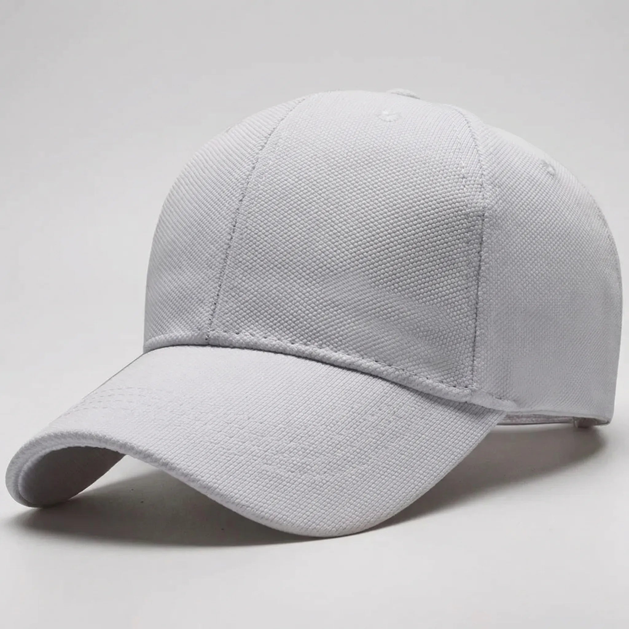 Minimalist baseball cap with adjustable flat peak and structured crown