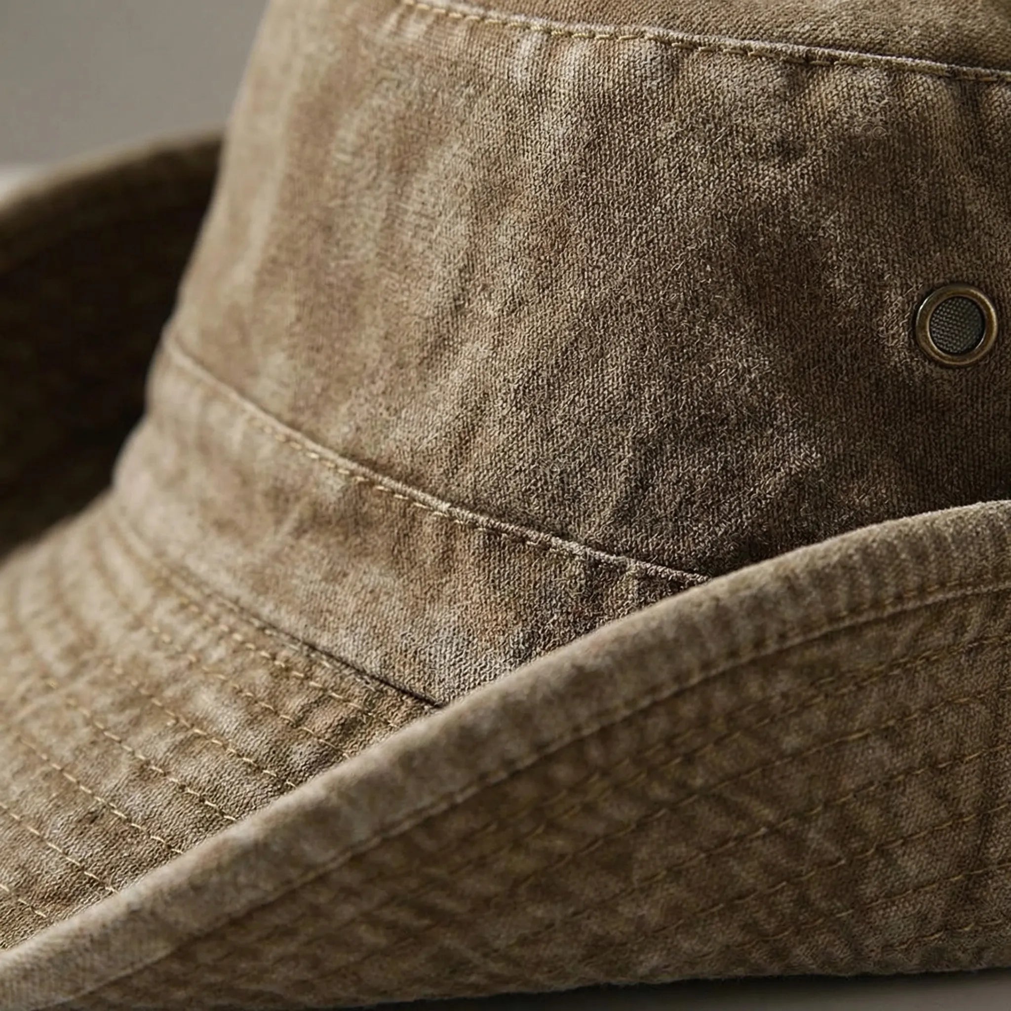 Unisex bucket hat with wide brim and flat top design for all-season outdoor wear