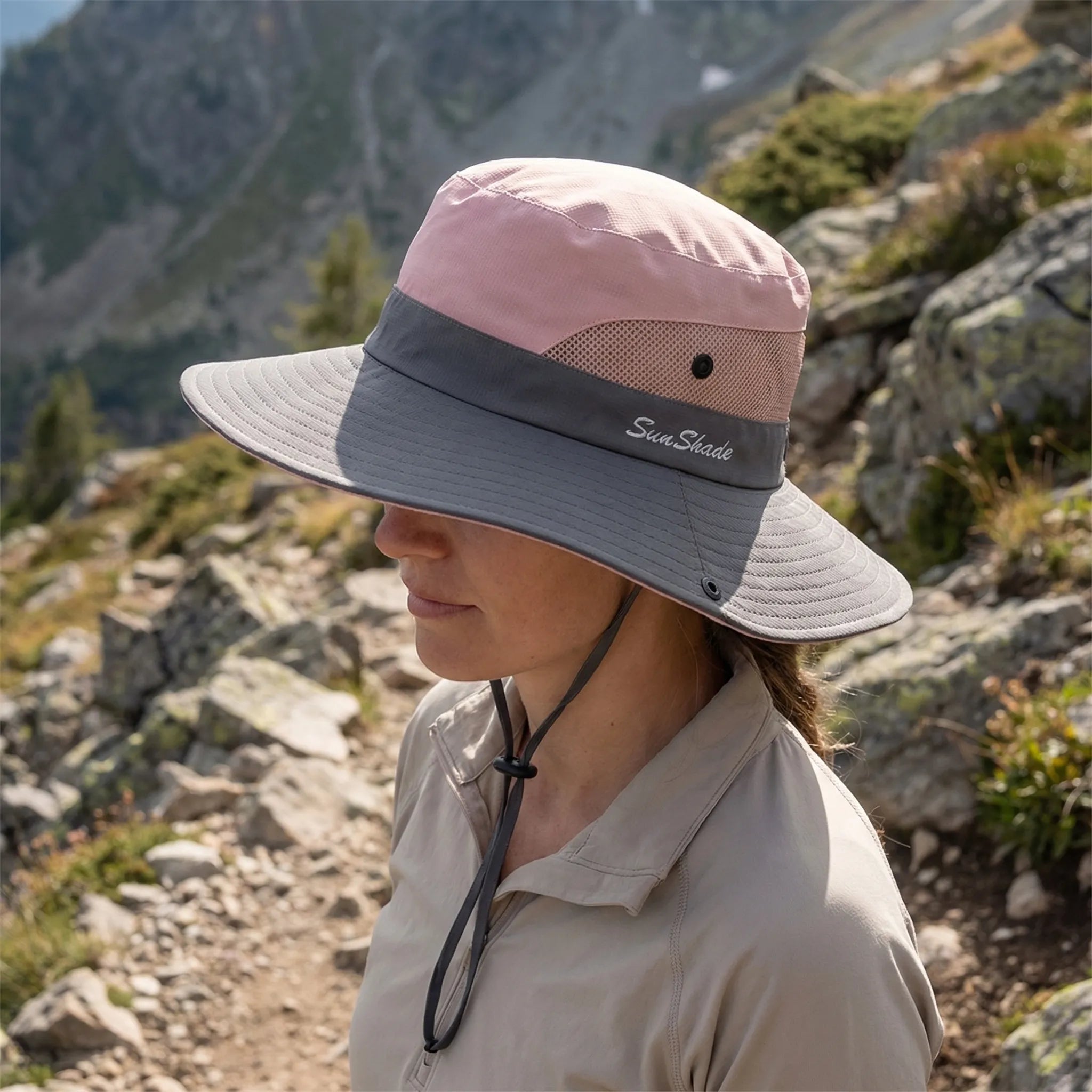 Wide-brim foldable sun hat with mesh panels and adjustable chin cord